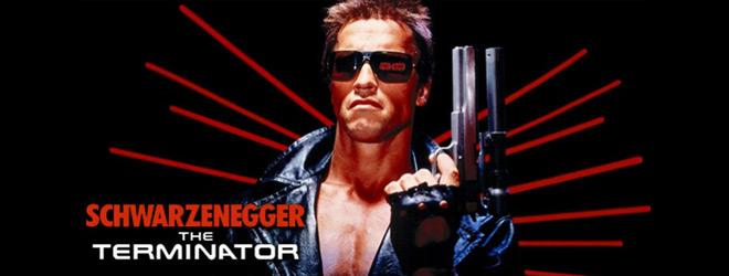 A blond, very muscular, miffle-aged, determined-looking, white man with short hair, holding a big handgun.

Caption:
"Schwarzenegger The Terminator"