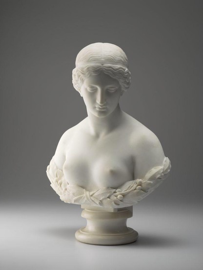 a bust sculpture, a woman with her hair elegantly braided and tied up, looing down and to the right
