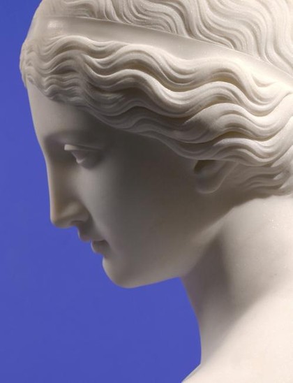 a close-up of her face, she is facing left