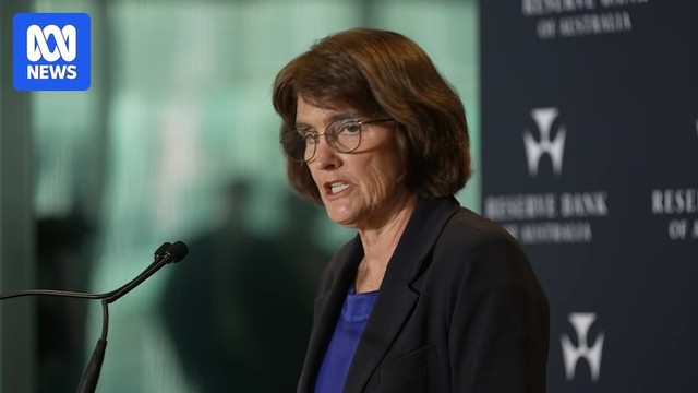 Michele Bullock at microphone at RBA press conference