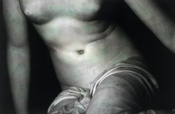 a close-up photo of her torso
