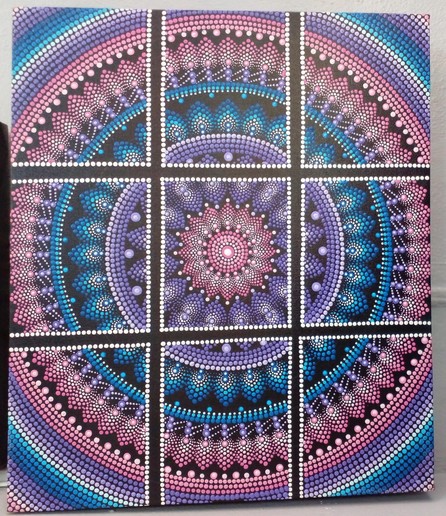 a painting of a mandala,  pink and blue and white and black dots in a floral type of circular design, with black bars coming down vertically and horizontally, 4 of them total