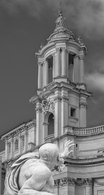 A figure from the Four Rivers fountain in the Piazza Navona in Rome Italy. The Church of Sant'Agnese is in the background. Processed in black and white. 

#statue #rome #italy #fountain #fourrivers #piazzanavona #church #belltower #baroque #blackandwhite #blackandwhitephotograpy #bernini #BuyIntoArt #AYearForArt #artforsale #wallartforsale #giftideas @joancarroll 

https://joan-carroll.pixels.com/featured/plata-river-god-and-church-rome-italy-joan-carroll.html
