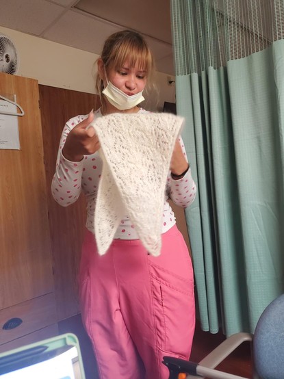 Holding scarf folded in half