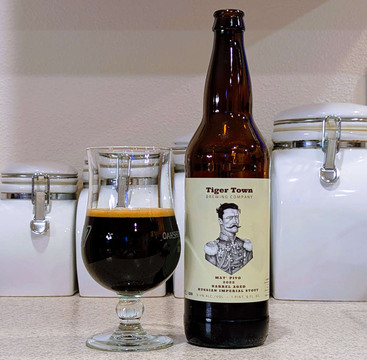 Tulip glass of Mat' Pivo 2023 Barrel Aged Russian Imperial Stout from Tiger Town Brewing of Mitchell, Oregon