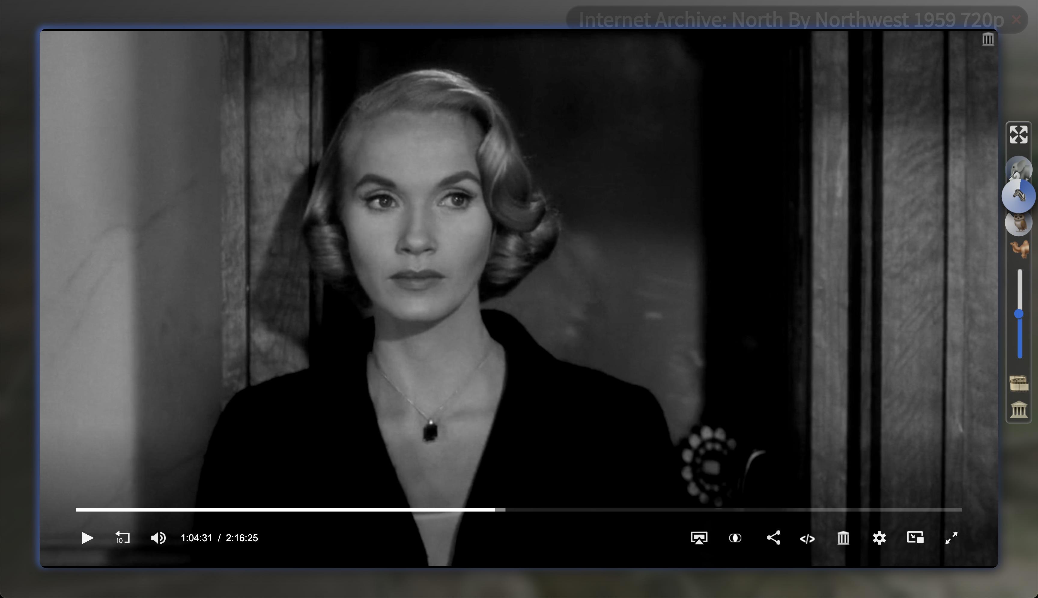 back and white movie shot of a blond young women leaving a phone booth 